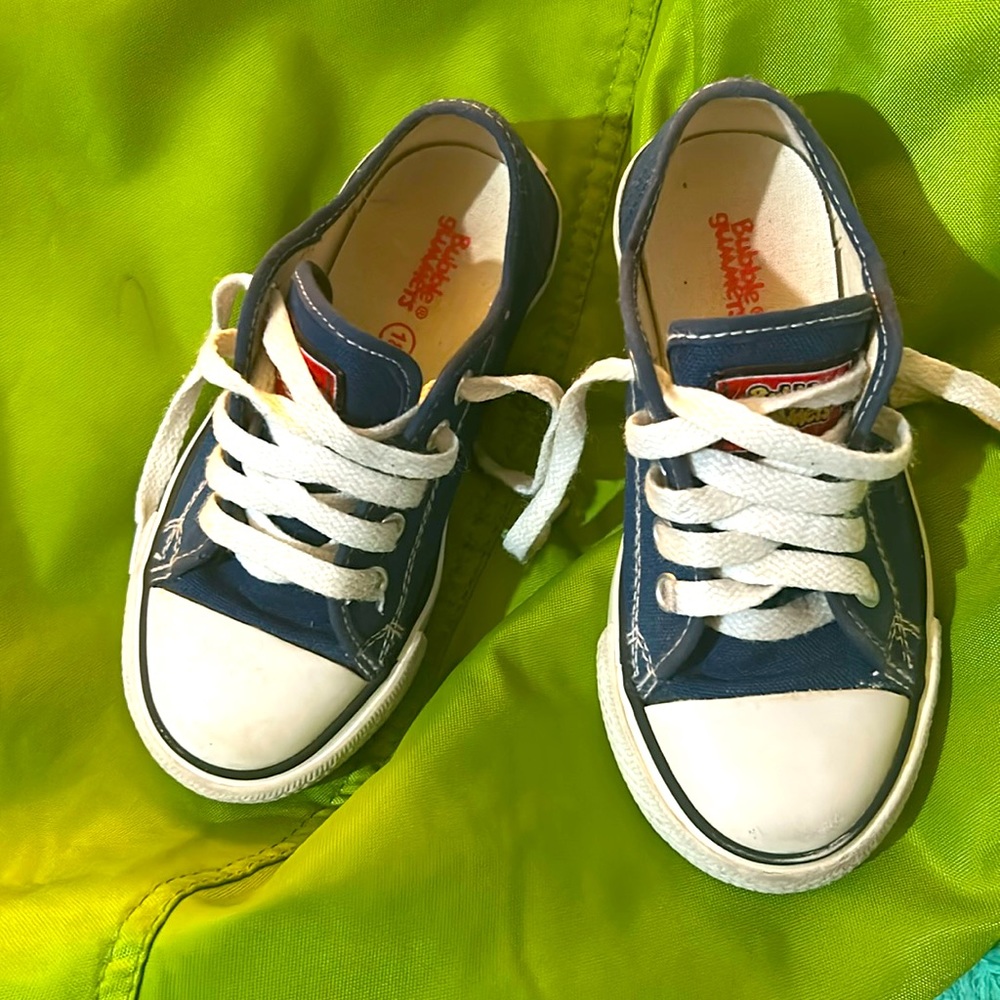 Navy blue converse style sneakers
